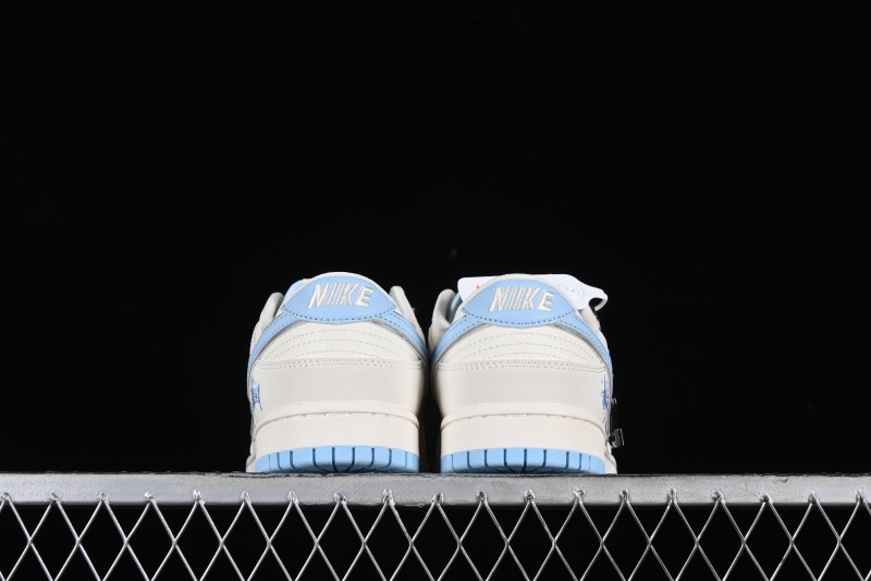 Stussy x Nike Dunk Low SB Skate Shoes in White with Light Blue Swoosh - DQ1098-380