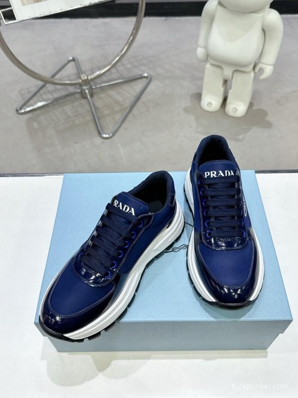 2025 Women Prada Blue Leather Sneakers KFY00310