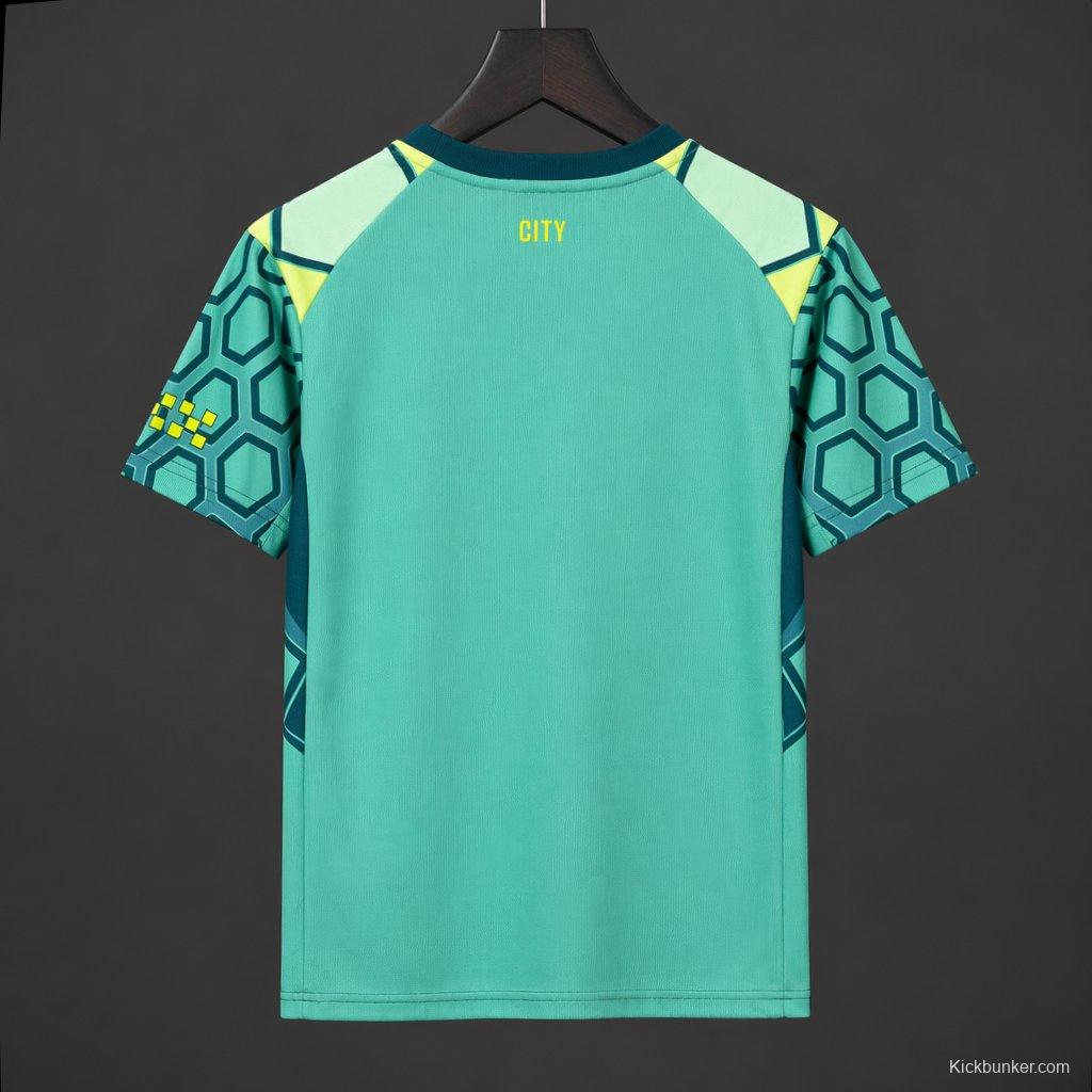 26/27 Manchester City Vibrant Green Goalkeeper Jersey With Dark Blue Geometric Pattern.